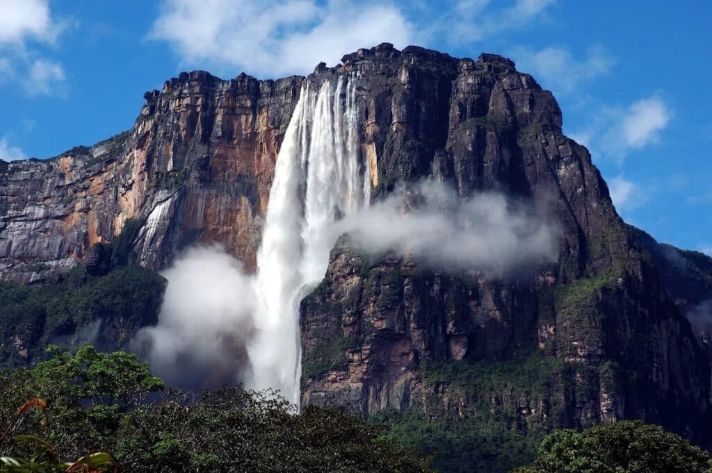 Angel Falls, the world's tallest waterfall, plunges majestically from a flat-topped mountain in Venezuela's Canaima National Park.